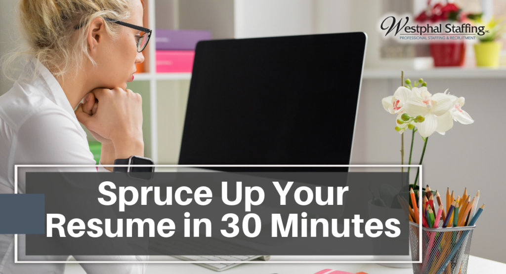 Woman staring at a blank computer screen