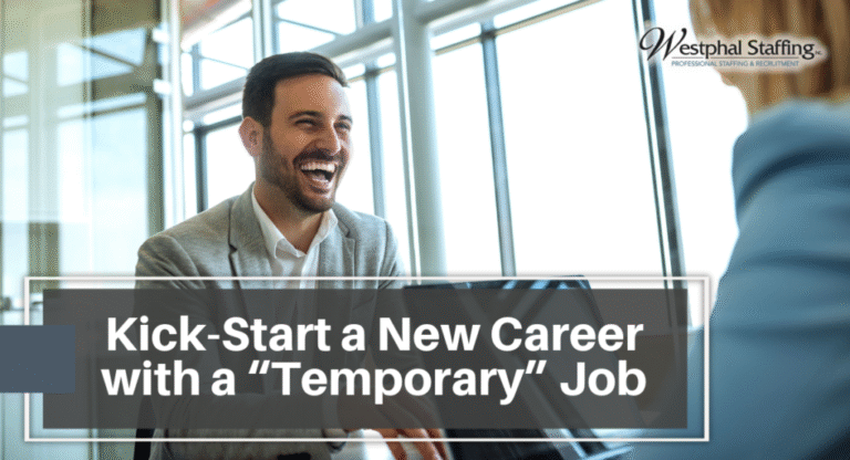 Man laughing in an interview