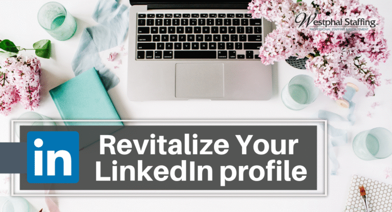 Office laptop with desk adorned with flowers