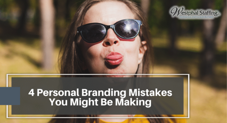 Woman wearing sun glasses sticking out her tongue